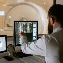 man looking at analytics with a data ecosystem