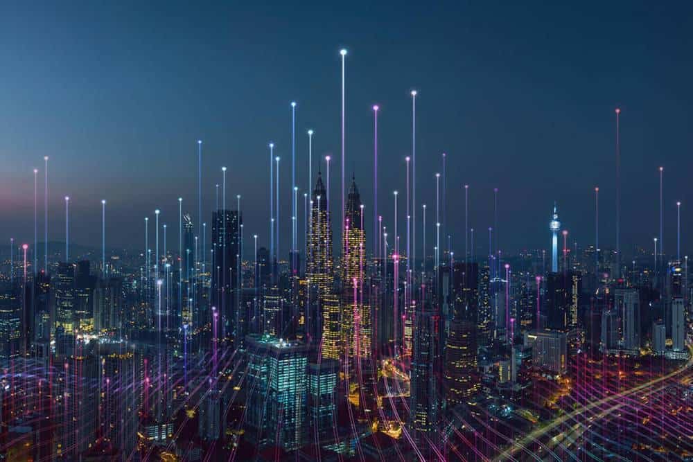 Futuristic digital cityscape with neon light trails connecting skyscrapers in a vibrant, modern metropolis scene.